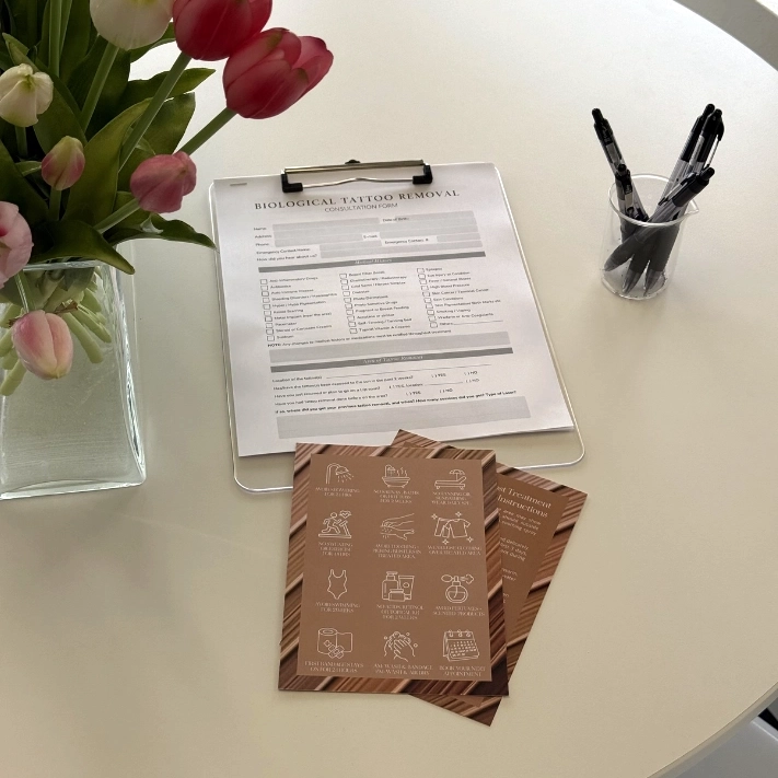 Biological Tattoo Removal consent form on a clipboard at the SkinScience clinic in Calgary - SkinScience Biological Tattoo Removal consent form on a clipboard at the SkinScience clinic in Calgary - SkinScience